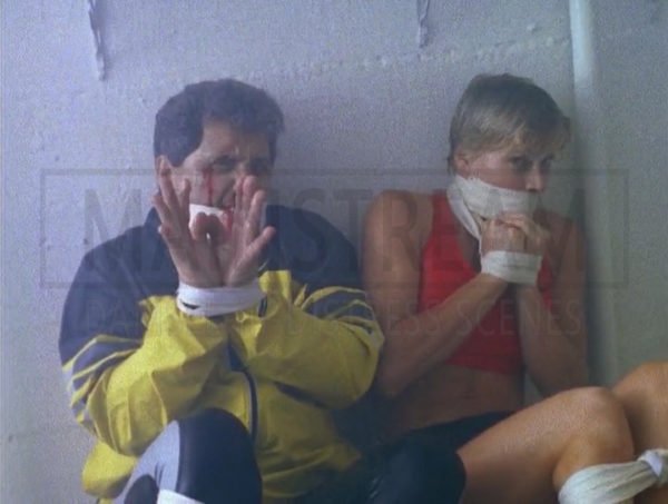 Nash Bridges Lisa McCullough Hands In Front Wraparound Tape Gagged 02