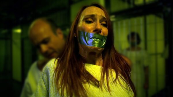 Andrea Sawatzki in 'Das Experiment' handcuffed and tape gagged