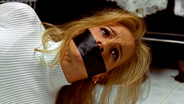 Rachel Griffiths in The Hard Word bound and tape gagged thumbnail