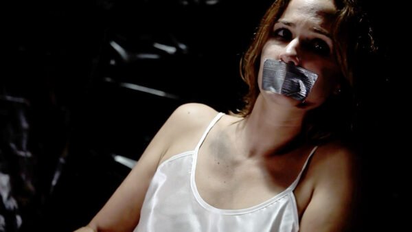 Woman chair tied and tape gagged wearing slip Thumbnail