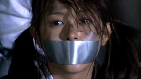 Yui Okada bound and tape gagged with bomb strapped in Yo-Yo Girl Cop Thumbnail