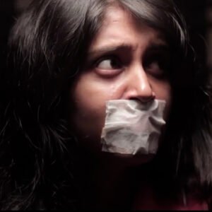 A woman kidnapped chair tied and tape gagged in SHE short film - thumbnail