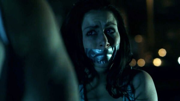 A woman bound and gagged is hunted by a crazy man in Hide & Seek short film - thumbnail