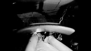 Women chair tied handcuffed and tape gagged in Bau Brut short film - 02