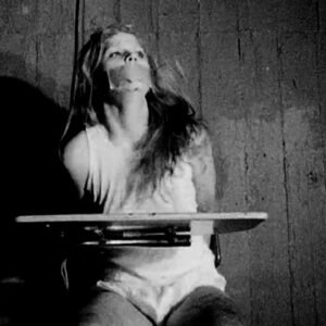 Women chair tied handcuffed and tape gagged in Bau Brut short film - thumbnail