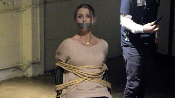 Woman chair tied and tape gagged in The Other Side short film - thumbnail
