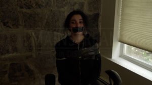 Carmel Coblence is kidnapped chair tied and tape gagged in short film Kidnapping Made Easy - 04